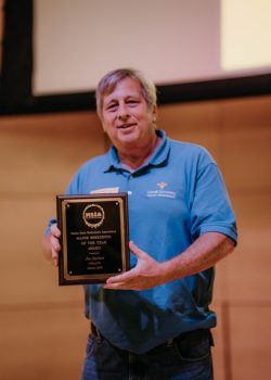 Photo of Joe Barberi receiving MSBA Beekeeper of the Year 2025